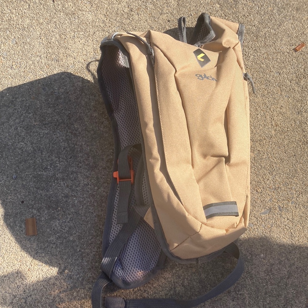 Tan and gray Gulch hiking backpack never been used. Smoke free home.